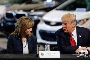 Mary Barra, CEO of General Motors, talks with President Trump at a press event in Ypsilanti Township, Michigan in March 2017.