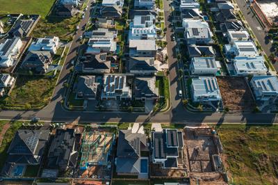 New houses equipped with rooftop solar panels in northwest Sydney, Australia.