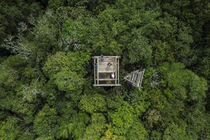 Aerial view of a tower in the Maya Biosphere Reserve's Uaxactun concession that is used by community members to monitor forest fires.