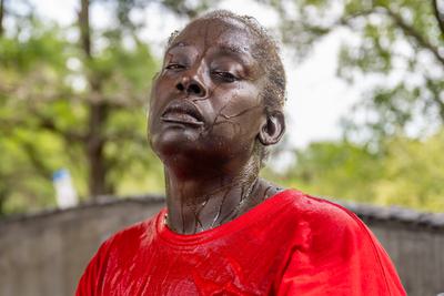 Andrea Washington after pouring water on herself during a heat wave in Austin, Texas in July 2023.