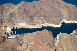 After two decades of drought, Lake Mead, which is impounded by Hoover Dam, is just 40 percent full. A “bathtub ring” visible along the edges of the lake show how far its water levels have dropped.