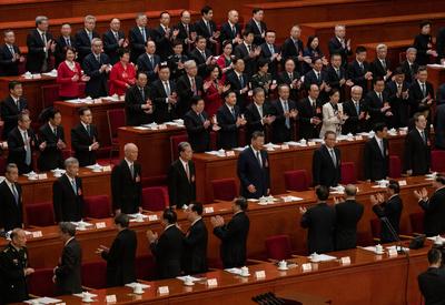 Chinese President Xi Jinping, center, at a meeting of the National People's Congress in Beijing earlier this month. The meeting marked the launch of the latest five-year-plan.