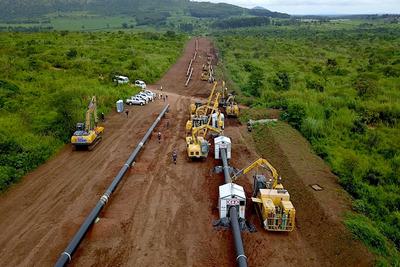 The East African Crude Oil Pipeline under construction in Uganda.