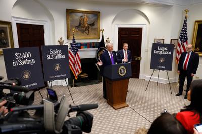 President Trump announces the repeal of the endangerment finding last month, with EPA Administrator Lee Zeldin and (far right) Office of Management and Budget Director Russell Vought.