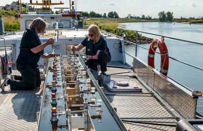 Scientists take samples from the Elbe River in Germany as part of a study on pollution in European waterways.