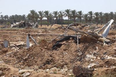 Wreckage on cropland in the Gaza Strip.
