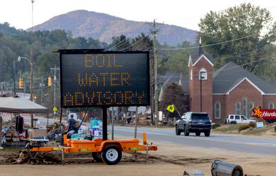 A "boil water" advisory set up in Old Fort, North Carolina, after Hurricane Helene flooded the local water treatment plant last October.