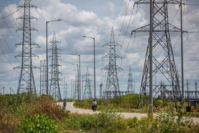 Transmission lines carry power from the Pavagada Solar Park in Vollur, India.