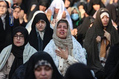Women perform a prayer for rainfall at the Saleh Shrine in Tehran in November.