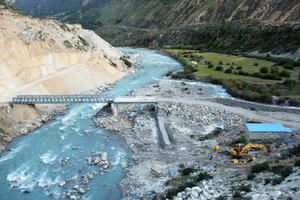 A bridge under construction across the Karnali River near the village of Tumkot, Nepal in October 2018.