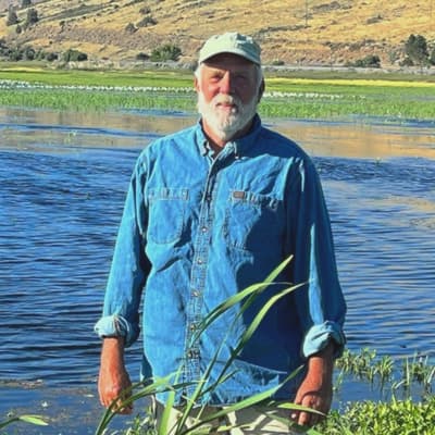 Left: Karl Wenner at a restored wetland at Lakeside Farms. Right: Lost River suckers in Upper Klamath Lake, Oregon.