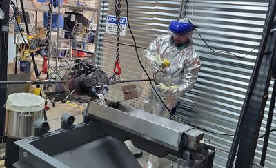 A technician pours a magnesium ingot at the Magrathea Metals facility in Oakland, California.