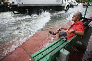 In Miami Beach (above), as elsewhere on the U.S. East Coast, flooding from seasonal high tides has been made worse in recent years by rising seas.