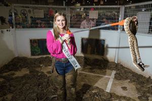 Katie Tyson, runner-up in the Miss Snake Charmer pageant, at the 2021 Rattlesnake Roundup in Sweetwater, Texas.