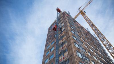 Mjösa Tower, the world's tallest wooden building, under construction in Brumunddal, Norway.