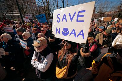 Demonstrators protest staffing cuts at NOAA in Silver Spring, Maryland, in 2025.