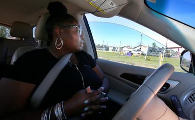 Roishetta Ozane driving through Lake Charles, Louisiana.