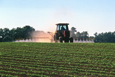 A farmer sprays herbicide on a soybean field near Lancaster, Pennsylvania.