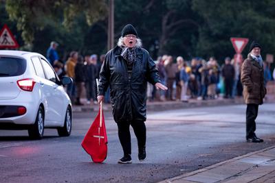 Baboon guardian Pauline Suddards confronts protesters in Kommetjie who want baboons out of the suburb.