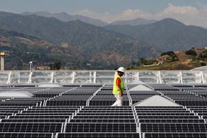 Solar panels cover the roof of a Sam's Club store in Glendora, Calif.