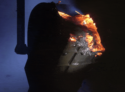 A satellite component burns up in a wind tunnel as part of a test to understand how it would disintegrate upon reentering the atmosphere.