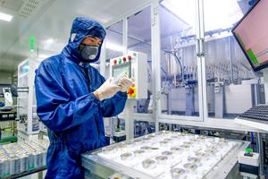 Workers manufacture sodium-ion batteries, an alternative to lithium-ion batteries, at Namey New Energy Technology in Luoyang, China.