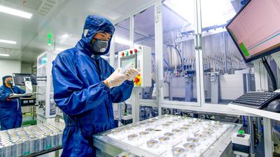 Workers manufacture sodium-ion batteries, an alternative to lithium-ion batteries, at Namey New Energy Technology in Luoyang, China.