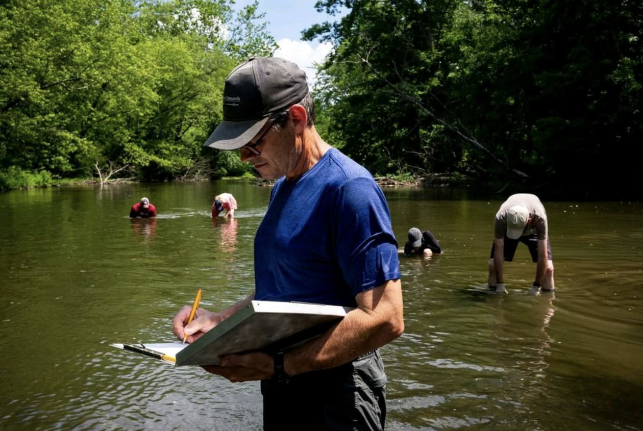 With the Great Mussel Die-Off, Scientists Scramble for Answers Researcher Wendell Haag wades into Dunkard Creek in Pennsylvania for a study on freshwater mussels. Michael Swensen